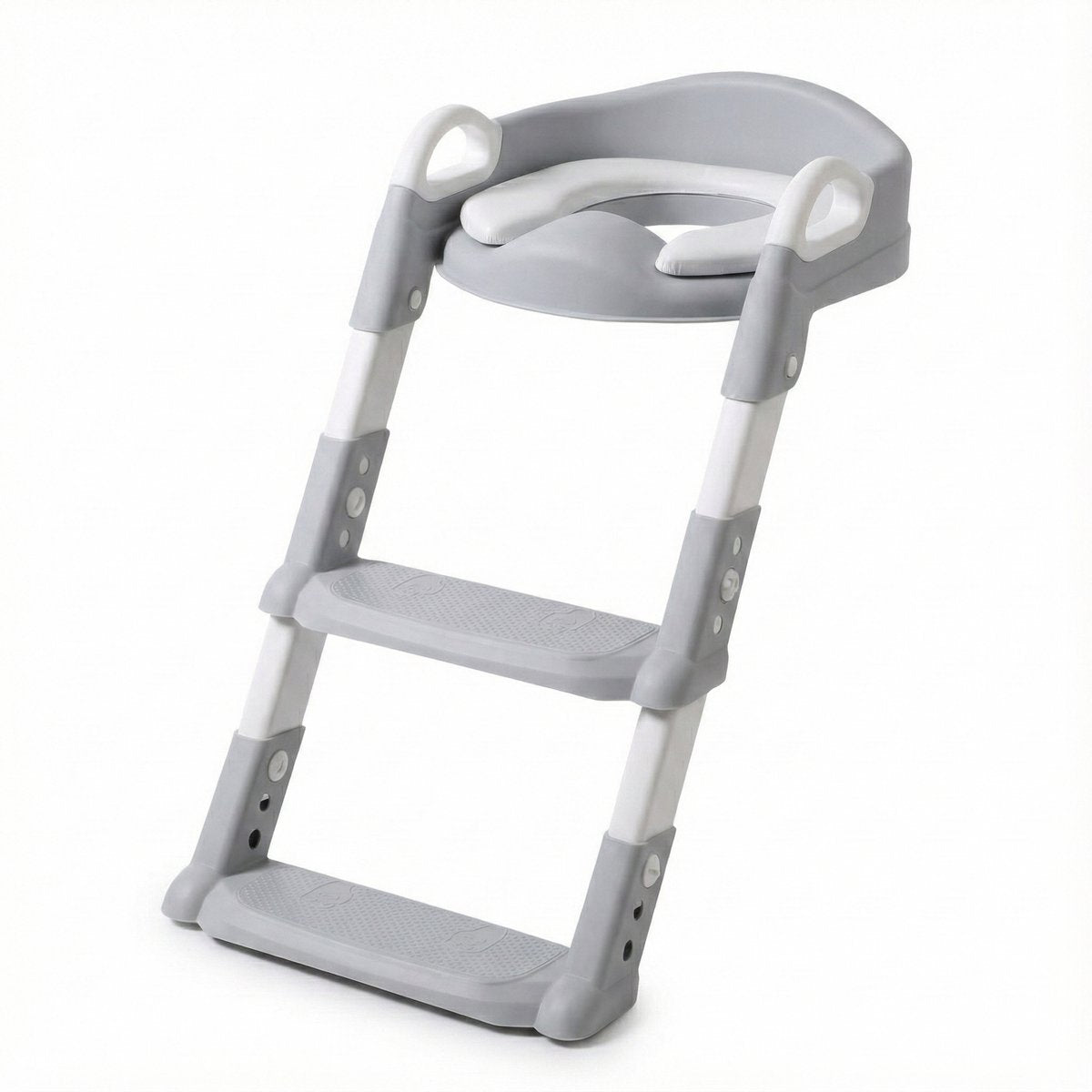 Grijze WC-verkleiner met trapje, klaar voor peuters, veiligheid en zelfstandigheid.